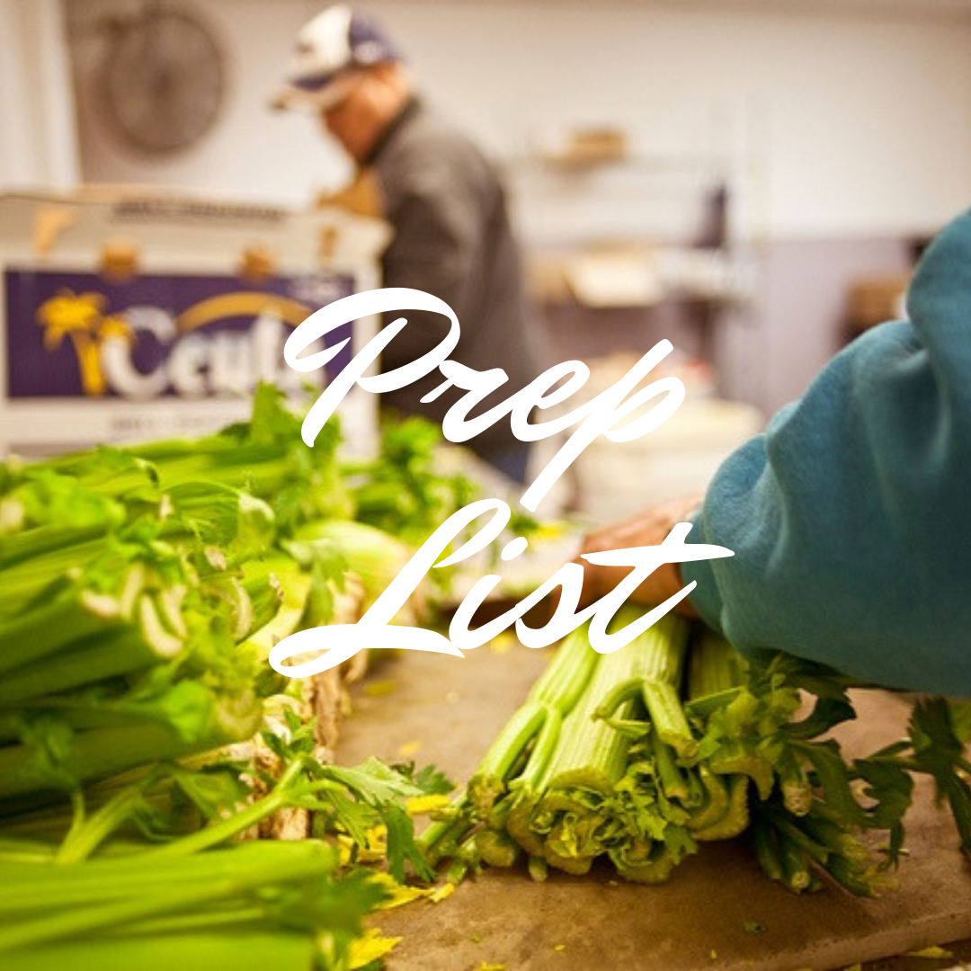 A warehouse worker prepping celery for a customer